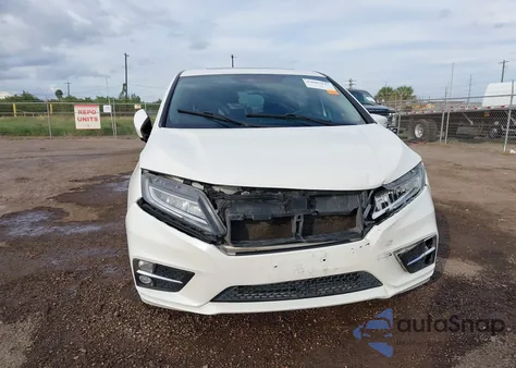 2018 Honda Odyssey Elite z USA, uszkodzony, nr VIN 5FNRL6H93JB050043